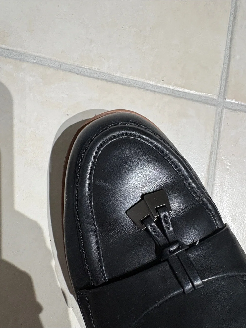 Clarks Black Leather Tassel-Style Slip-On Loafers with Brown Sole Accent